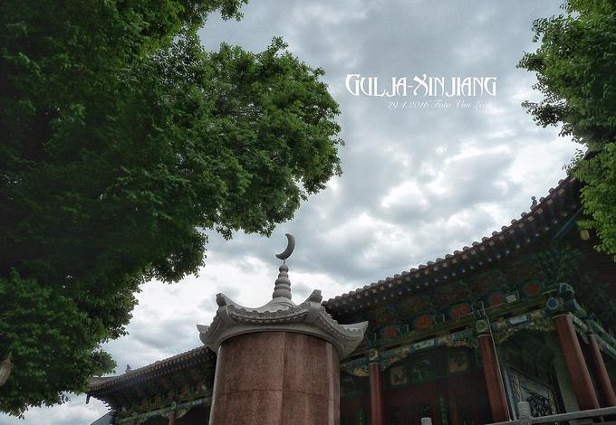 Ancient ruined walls and foundations under open sky in Xinjiang